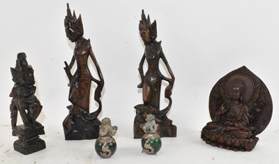 Lot 576 - A small group of Chinese hardwood carvings, to...