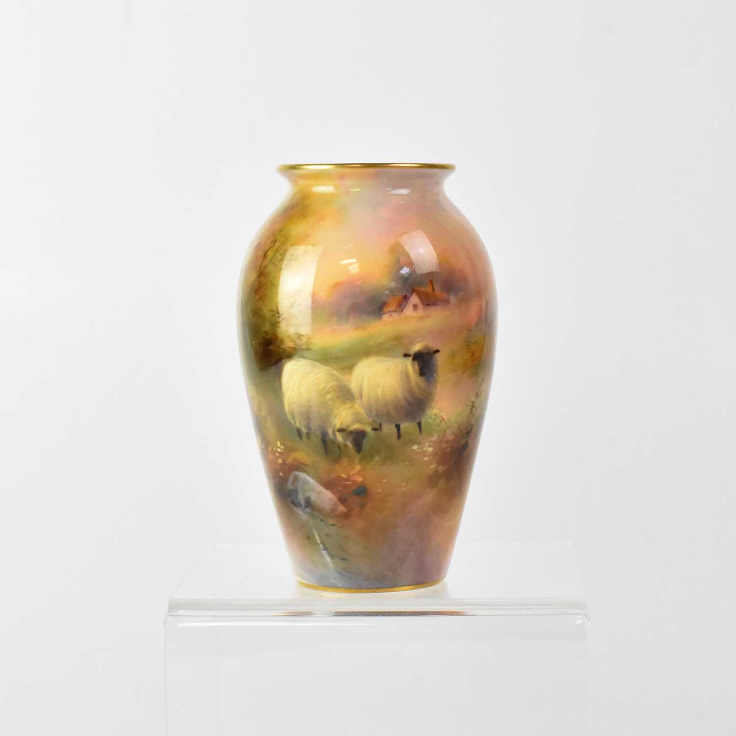 Lot 394 - ROYAL WORCESTER; a small blush ivory vase with...