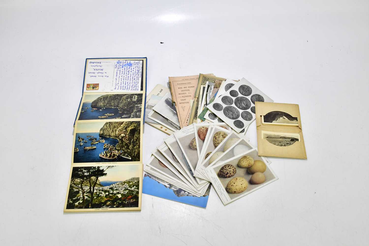 Lot 1500 - A small collection of postcards to include