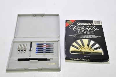 Lot 2111 - A cased Parker fountain pen set together with...