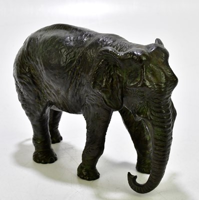 Lot 2125 - A bronze figure of an African elephant,...