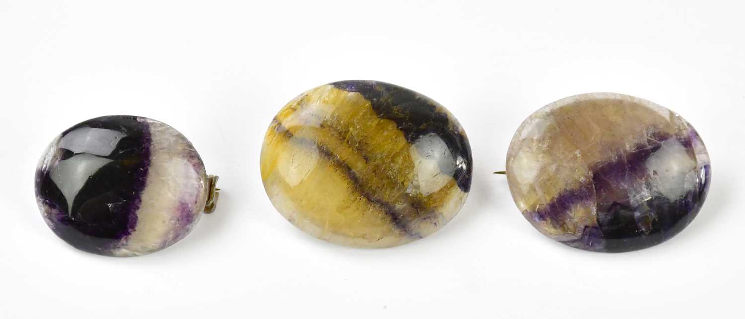 Lot 315 - A group of three Blue John brooches.