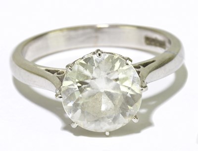 Lot 122 - An 18ct yellow gold solitaire ring, the...