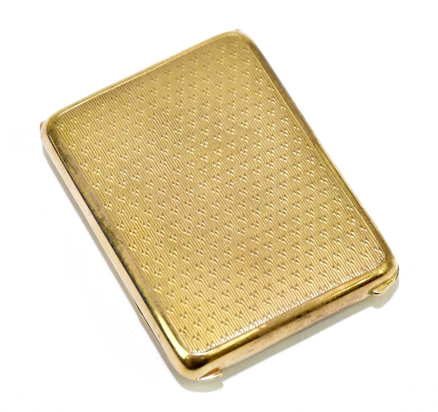 Lot 344 - A 9ct yellow gold engine turned matchbook...