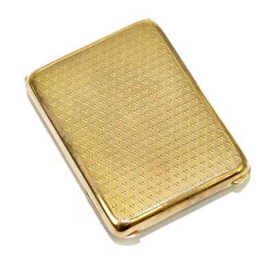 Lot 344 - A 9ct yellow gold engine turned matchbook...