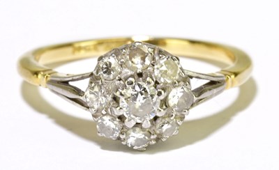 Lot 52 - An 18ct yellow gold platinum tipped diamond...