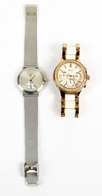Lot 833 - DKNY; a rose gold tone and white ceramic...