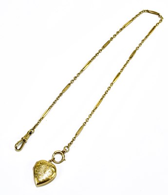 Lot 259 - A 9ct yellow gold chain suspending a heart...