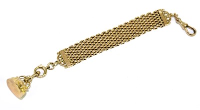 Lot 351 - A yellow metal mesh short fob chain with solid...