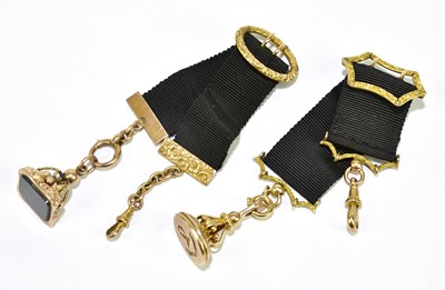 Lot 348 - Two 19th century yellow metal fob seals, one...
