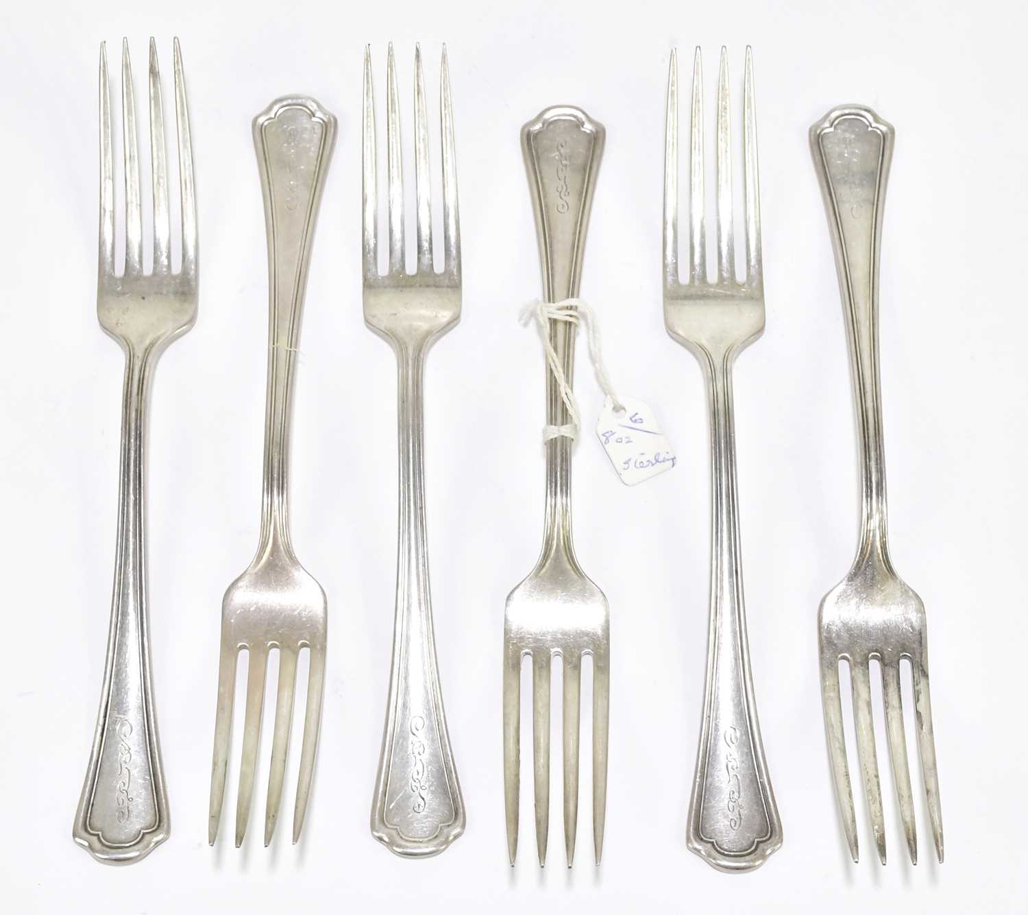 Lot 1199 - A set of six sterling silver dinner forks with...