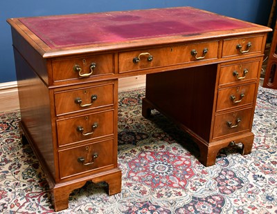 Lot 2562 - A reproduction mahogany twin pedestal knee...