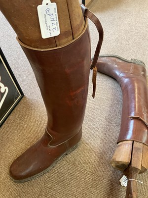 Lot 2241 - A pair of leather horse riding boots, with trees.