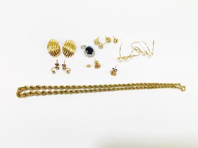 Lot 376 - A yellow metal rope twist necklace...