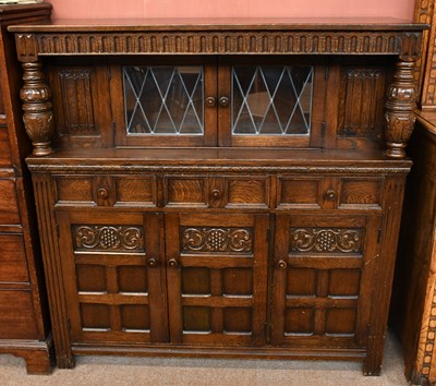 Lot 2577 - A reproduction oak court cupboard, two lead...