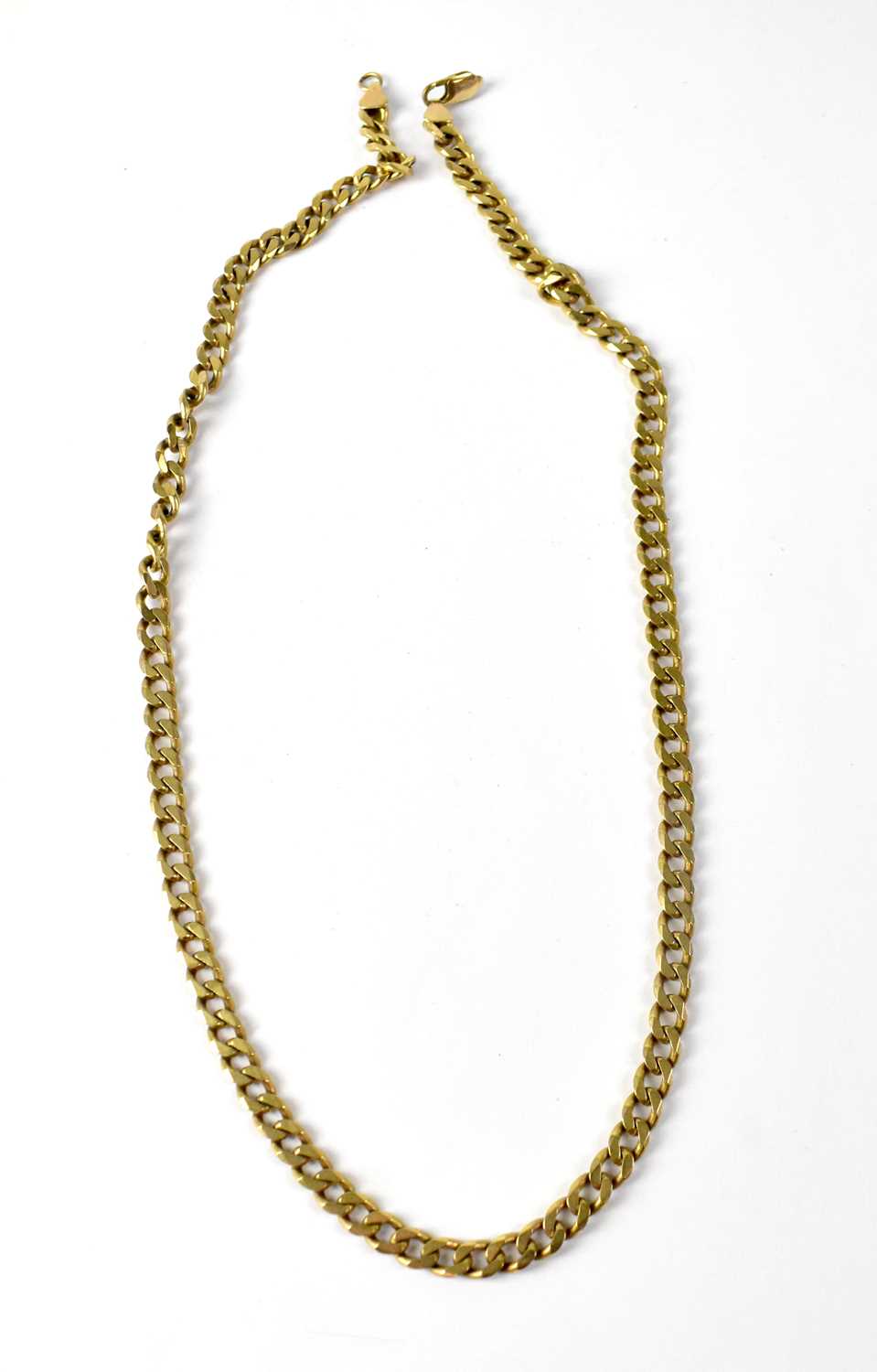 Lot 957 - A 9ct gold flat link curb necklace