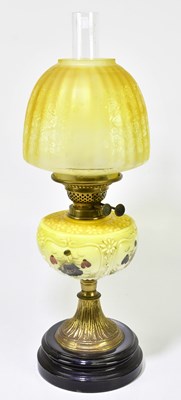 Lot 2324 - A Victorian oil lamp, the yellow glass shade...