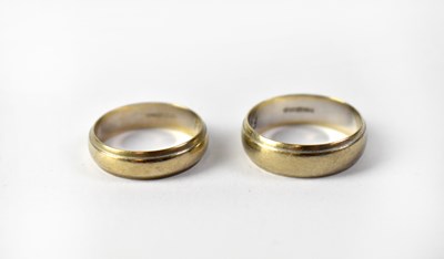 Lot 1062 - A pair of 9ct white gold wedding bands