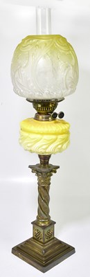 Lot 2322 - A Victorian oil lamp, the yellow and clear...