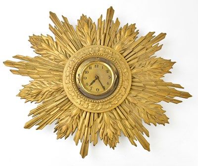 Lot 2300 - An Art Deco gilt plaster sunburst wall clock,...
