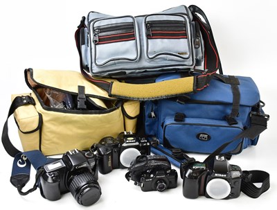 Lot 2168 - An assortment of cameras and accessories to...