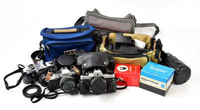 Lot 2172 - An assortment of cameras and accessories to...