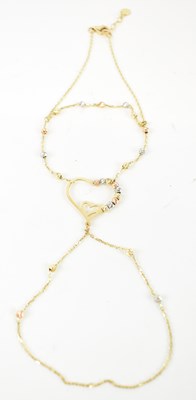 Lot 746 - A modern 14ct yellow gold lady's bracelet,...