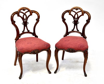 Lot 29 - A set of six late 19th century walnut dining chairs