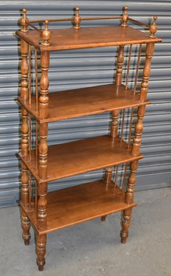 Lot 20 - A Victorian style stained beech four tier...