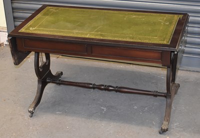 Lot 67 - A reproduction drop-leaf coffee table with...