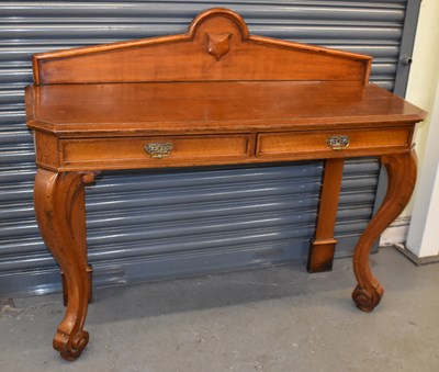 Lot 6 - A Victorian oak two drawer hall table on...