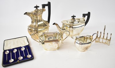 Lot 611 - A silver plated four piece tea service.