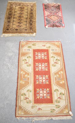 Lot 103 - Three small hand knotted woollen rugs, 120 x...