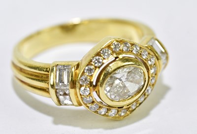 Lot 11 - A yellow metal diamond ring with oval collet...