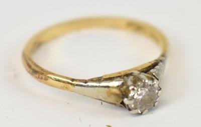 Lot 717 - An 18ct yellow gold and platinum solitaire...