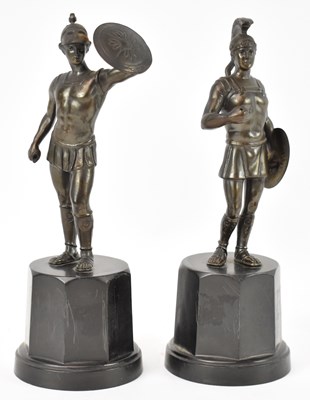 Lot 604 - A pair of bronzed metal figures of gladiators,...