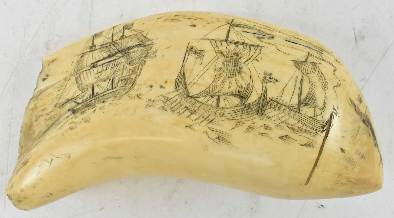 Lot 201 - A large 19th century scrimshaw whale's tooth...