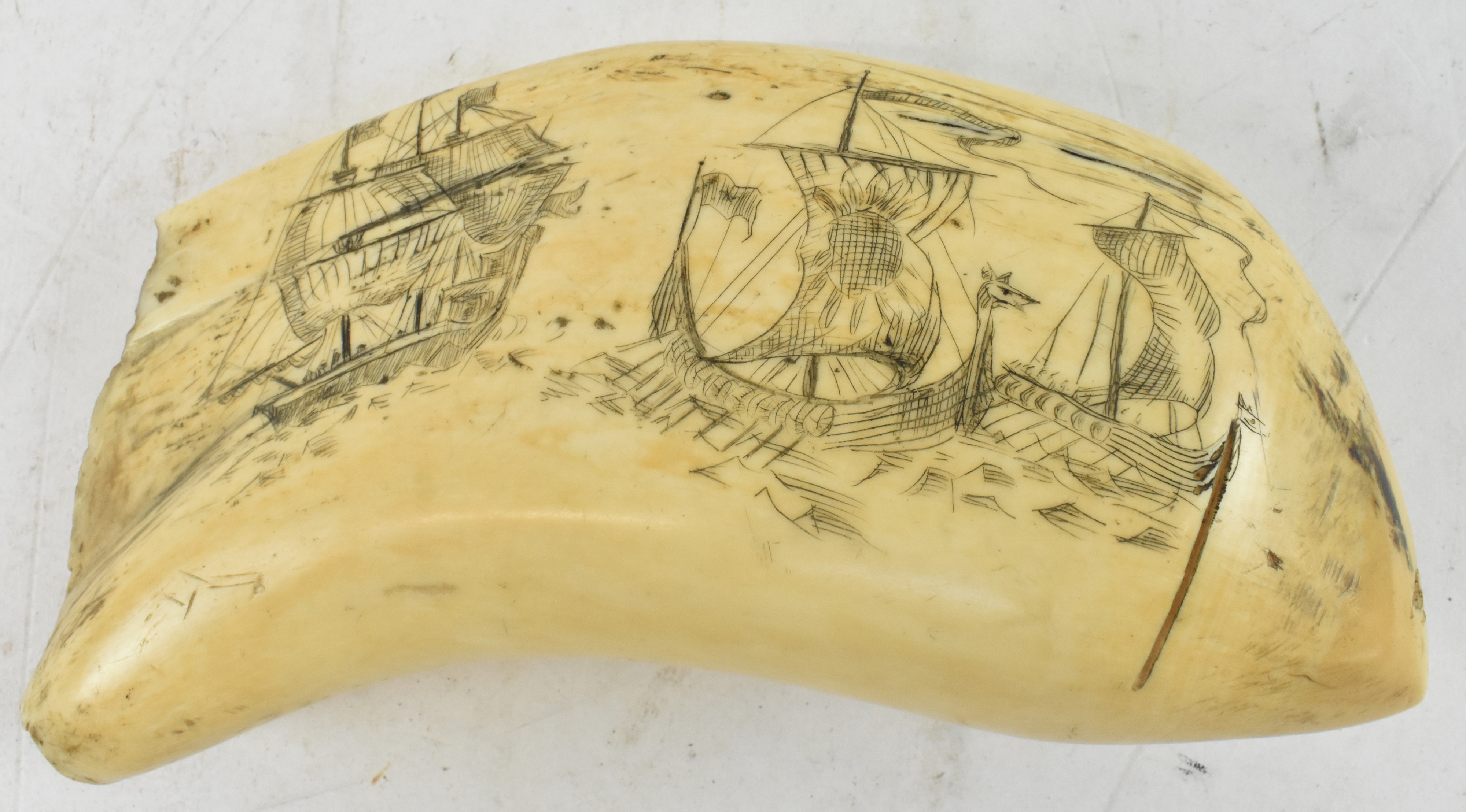 Lot 201 - A large 19th century scrimshaw whale's tooth