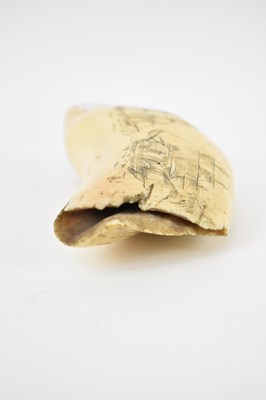 Lot 201 - A large 19th century scrimshaw whale's tooth...