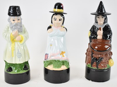 Lot 457 - Three ceramic novelty decanters, marked Angie...