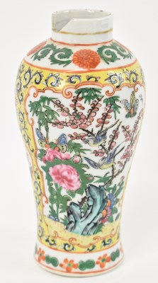 Lot 557 - A Chinese yellow ground and polychrome floral...