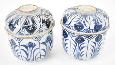 Lot 559 - A pair of Chinese blue and white pots with...