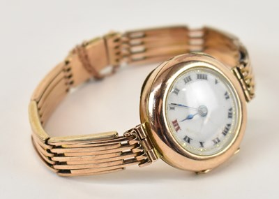 Lot 844 - An early 20th century 9ct gold lady's watch...