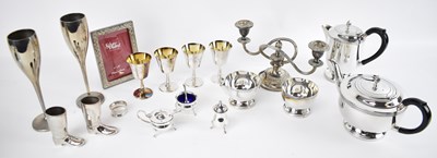 Lot 618 - A four piece silver plated tea service, four...