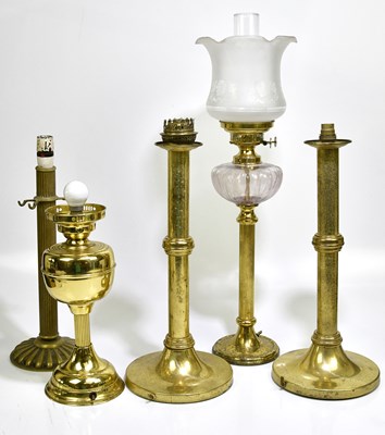 Lot 2237 - Five modern brass table lamps.