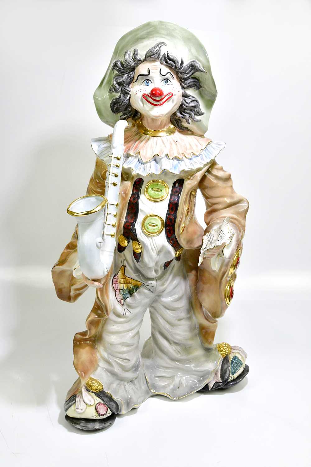 Lot 1439 - 'SCARY CLOWN'; a large 1970s pottery figure of...