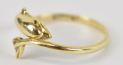 Lot 805 - A 14ct yellow gold ring modelled as a dolphin,...