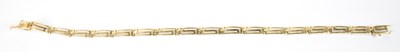 Lot 713 - A 14ct yellow gold bracelet, length 20cm,...