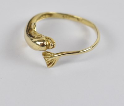 Lot 782 - A 14ct yellow gold ring modelled as a dolphin,...