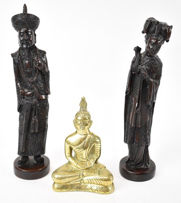 Lot 577 - Two 20th century Chinese carved resin figures...